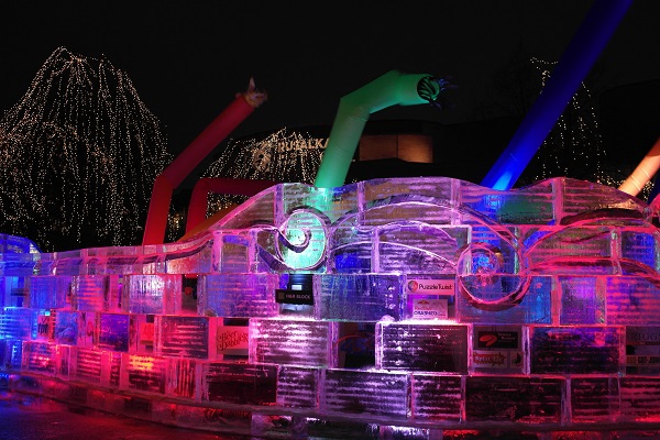EMC photo of St Paul Winter Carnival Ice Castle with multicolor LED lighting