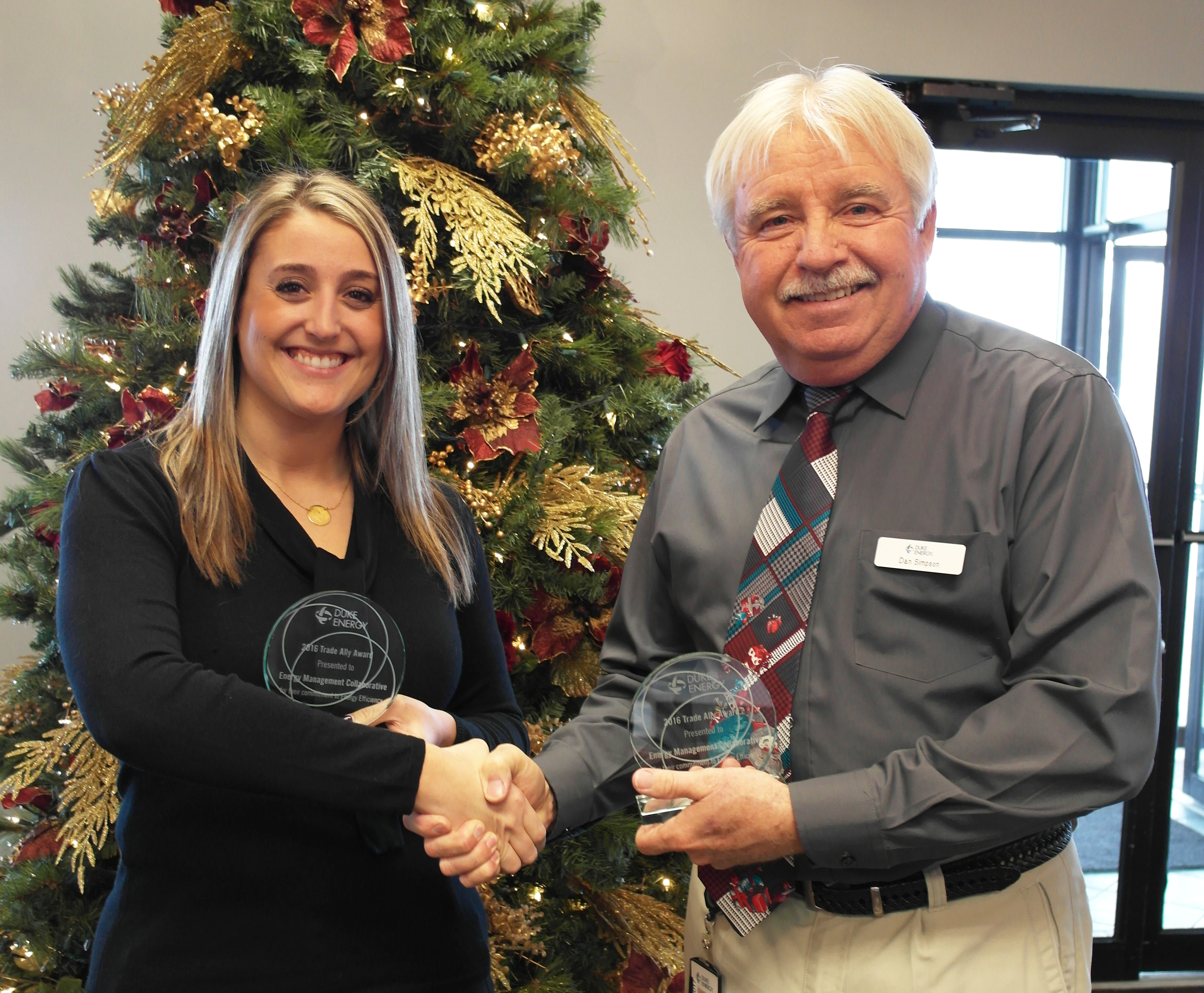 EMC photo of Katie Quam receiving Duke Energy Award 