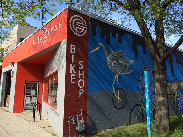 EMC photo of Full Cycle bike shop from curb in Minneapolis, Minnesota