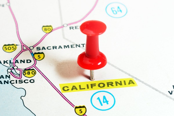EMC photo of a map with a pin placed in California
